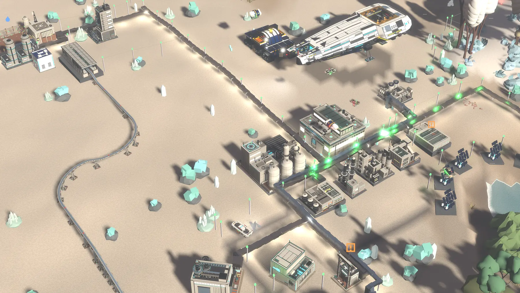 A working colony with maglev line, industry and habitats spread across pale sand
